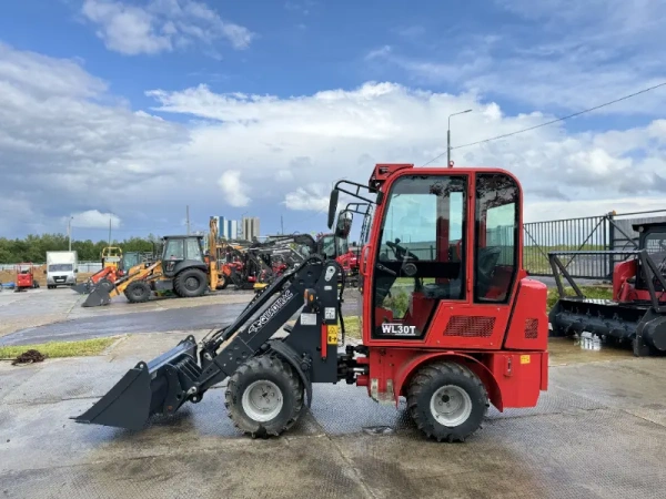 Телескопический мини погрузчик QUADTRAC WL30T