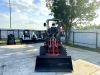 Мини-экскаватор-погрузчик QUADTRAC XN228