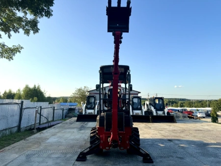 Мини-экскаватор-погрузчик QUADTRAC XN228