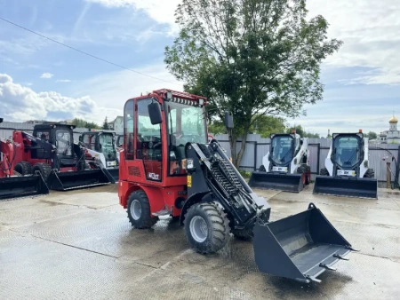 Телескопический мини погрузчик QUADTRAC WL30T