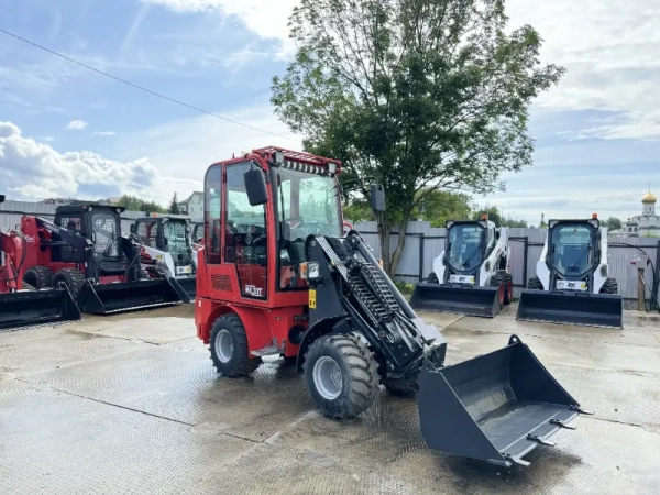 Телескопический мини погрузчик QUADTRAC WL30T
