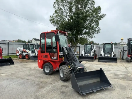 Телескопический мини погрузчик QUADTRAC WL30T