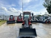 Телескопический мини погрузчик QUADTRAC WL30T
