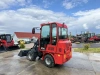 Телескопический мини погрузчик QUADTRAC WL30T