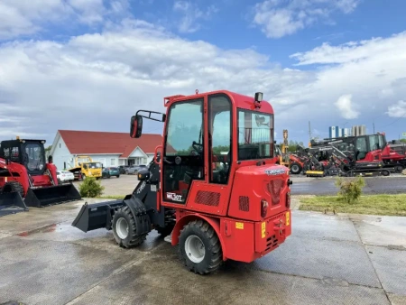 Телескопический мини погрузчик QUADTRAC WL30T